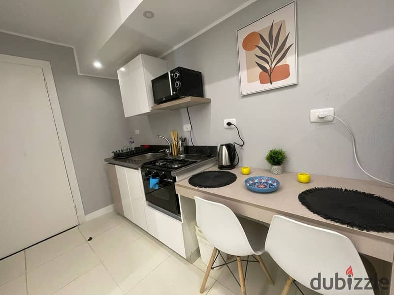 Ultra super luxury furnished studio apartment for rent in the Fifth District, close to services - Fifth Settlement 11