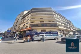 Ready to move Apartment For Sale In Front of METRO in Main Al Tahrir Street El Dokki Very Suitable for Investment or Housing 0