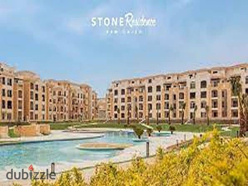 Ground floor apartment with garden for sale in Stone Residence Compound, Fifth Settlement, immediate receipt and direct lake view, area of ​​two rooms 4