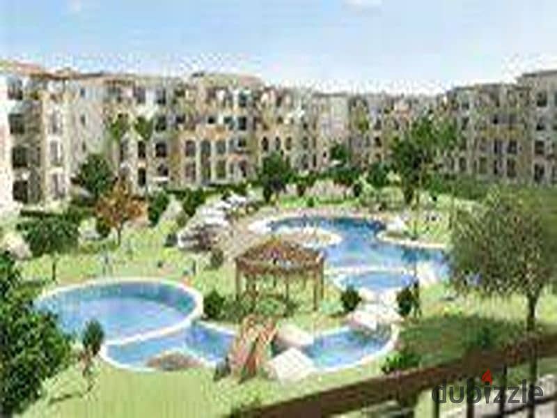 Ground floor apartment with garden for sale in Stone Residence Compound, Fifth Settlement, immediate receipt and direct lake view, area of ​​two rooms 5