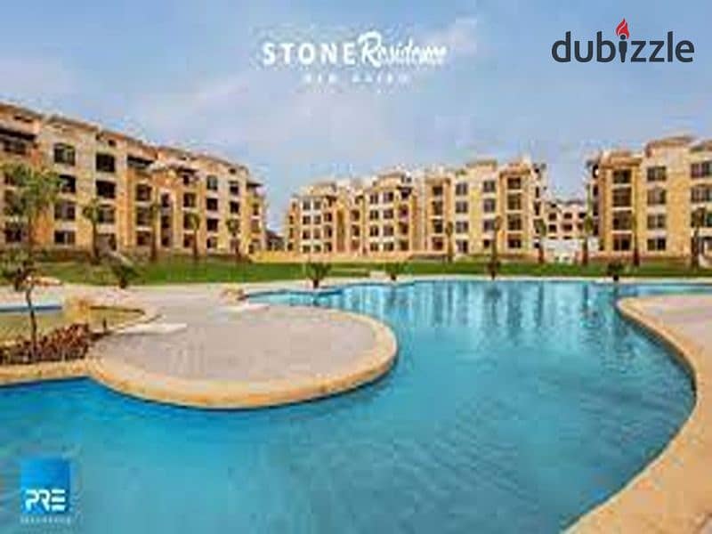 Ground floor apartment with garden for sale in Stone Residence Compound, Fifth Settlement, immediate receipt and direct lake view, area of ​​two rooms 7