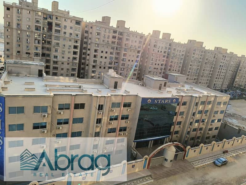 For sale, a 3-bedroom apartment with an open view, second row on Al-Saada Street, next to Maadi Dunes, Zahraa Al-Maadi 1