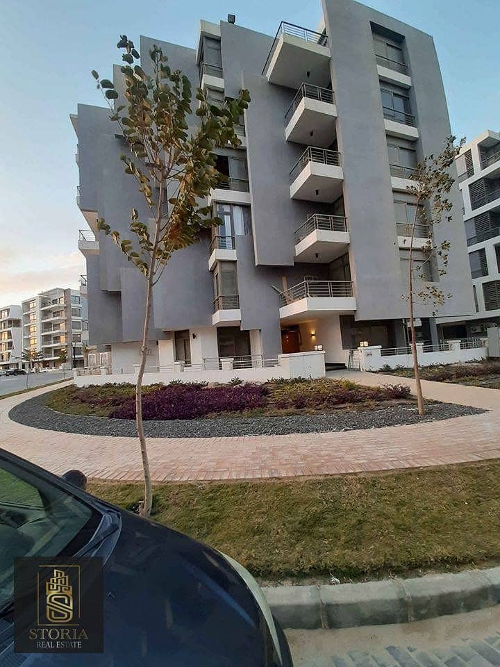 Apartment for sale directly in front of the airport on Suez Road, with a down payment of 1,200,000 and installments over 8 years without any interest. 1