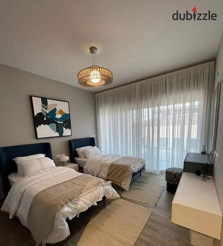 Two-bedroom apartment for sale, ultra super deluxe finishing, in Mostakbal City, Bloomfields, New Cairo 3