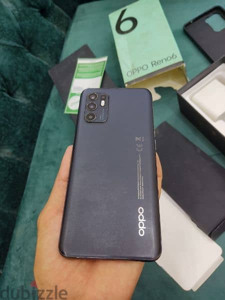 Oppo Reno 6 حالته جيده جدا معاه كرتونه والشاحن الأصلي وجر 1