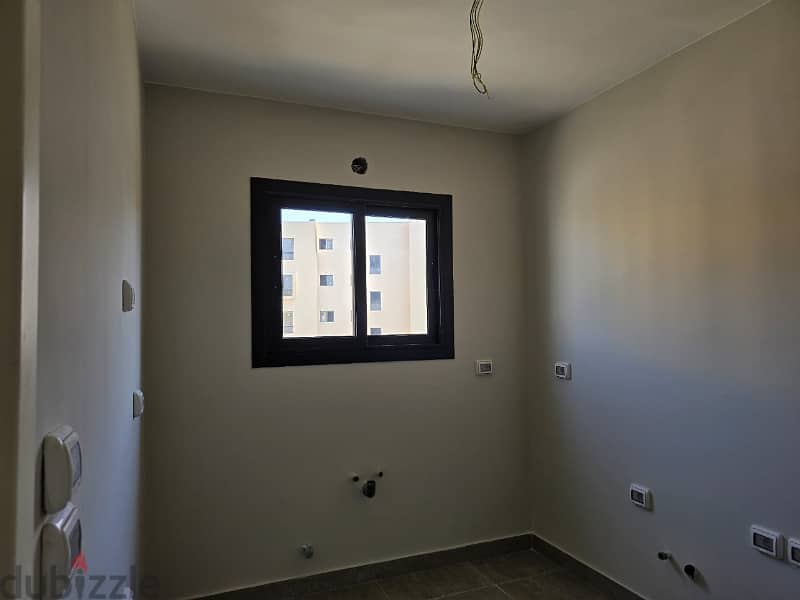 Apartment for sale at Owest شقة للبيع بكمبوند أويست متشطبة بالكامل 11