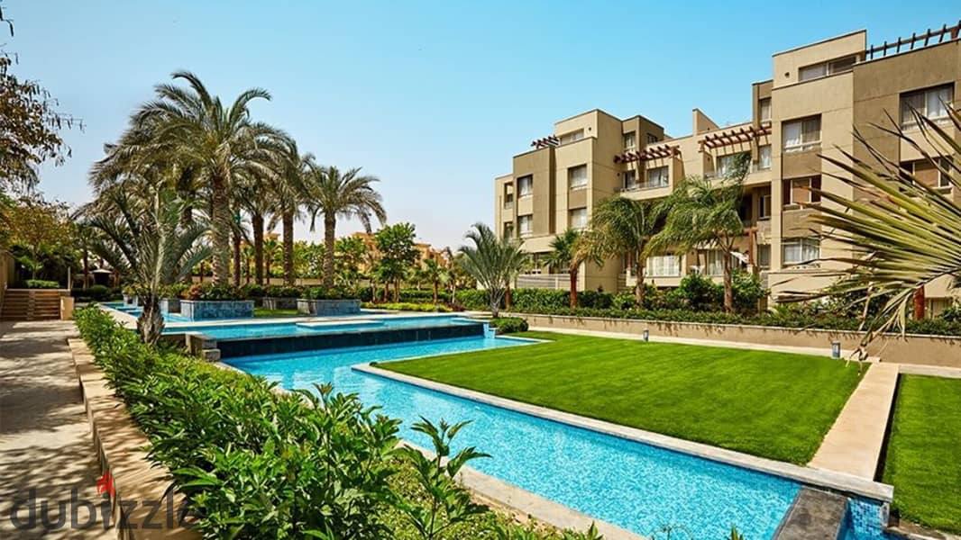 2 bedroom apartment for sale with open view of landscape and wide green spaces in Swan Lake Residence Compound, Hassan Allam, New Cairo, in front of R 3