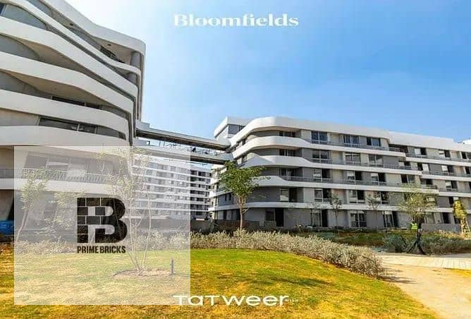 للبيع بتقسيط على 10 سنين شقة كامل التشطيب  105 متر في بلوم فيلد  Bloomfield  في المستقبل سيتي 14