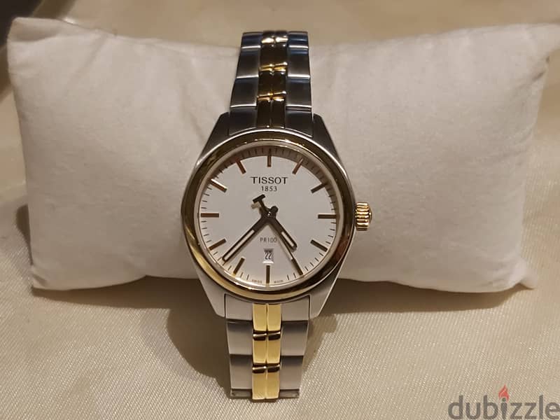 Tissot T101210A watch gold not used before 1