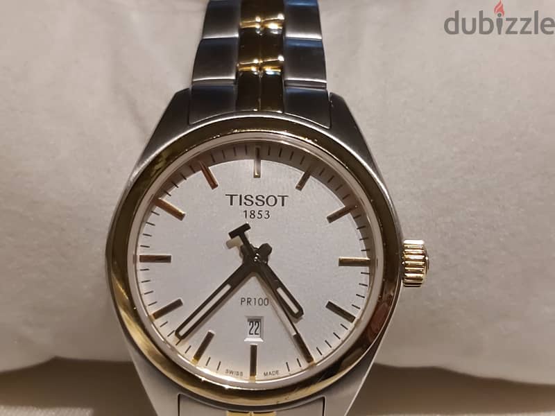 Tissot T101210A watch gold not used before 2