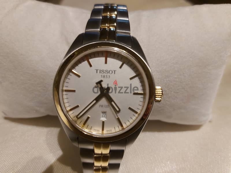 Tissot T101210A watch gold not used before 3