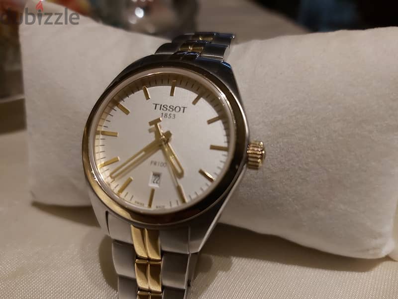 Tissot T101210A watch gold not used before 4