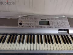 Yamaha . Portable grand DGX-300 0