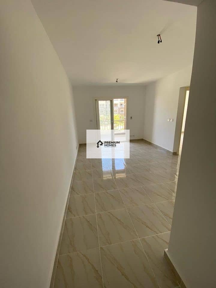 Two-bedroom apartment for sale, immediate delivery, fully finished, in front of services, garden view, at a special price in Madinaty 1