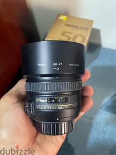 عدسة نيكون 50mm 1.4 0