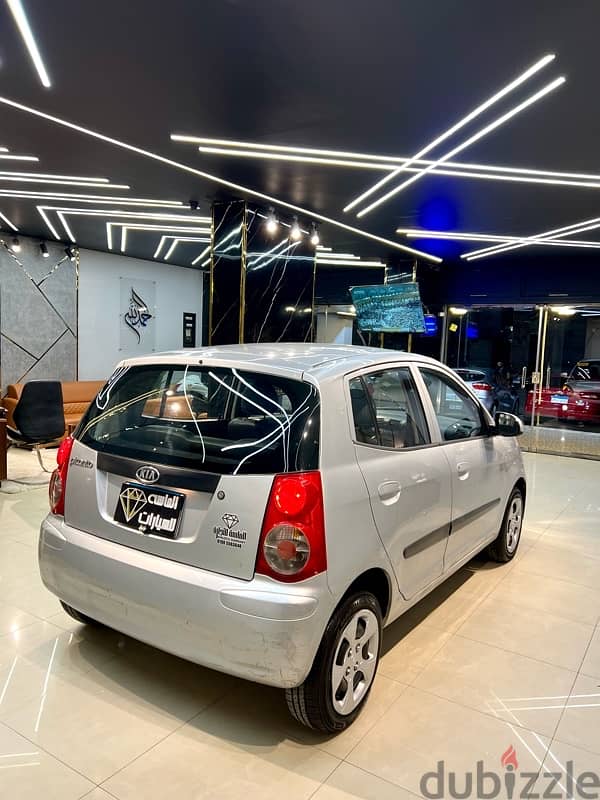 Kia Picanto 2011 فابريكة بره وجوه 3