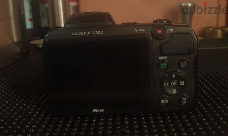 كاميرا nikon coolpix l330  بحاله ممتازه 1