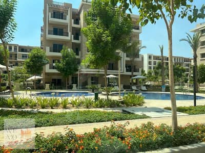 Resale apartment for sale with a down payment of 2.5 million in Taj City compound, with a direct landscape view, Origami phase, in the Fifth 132