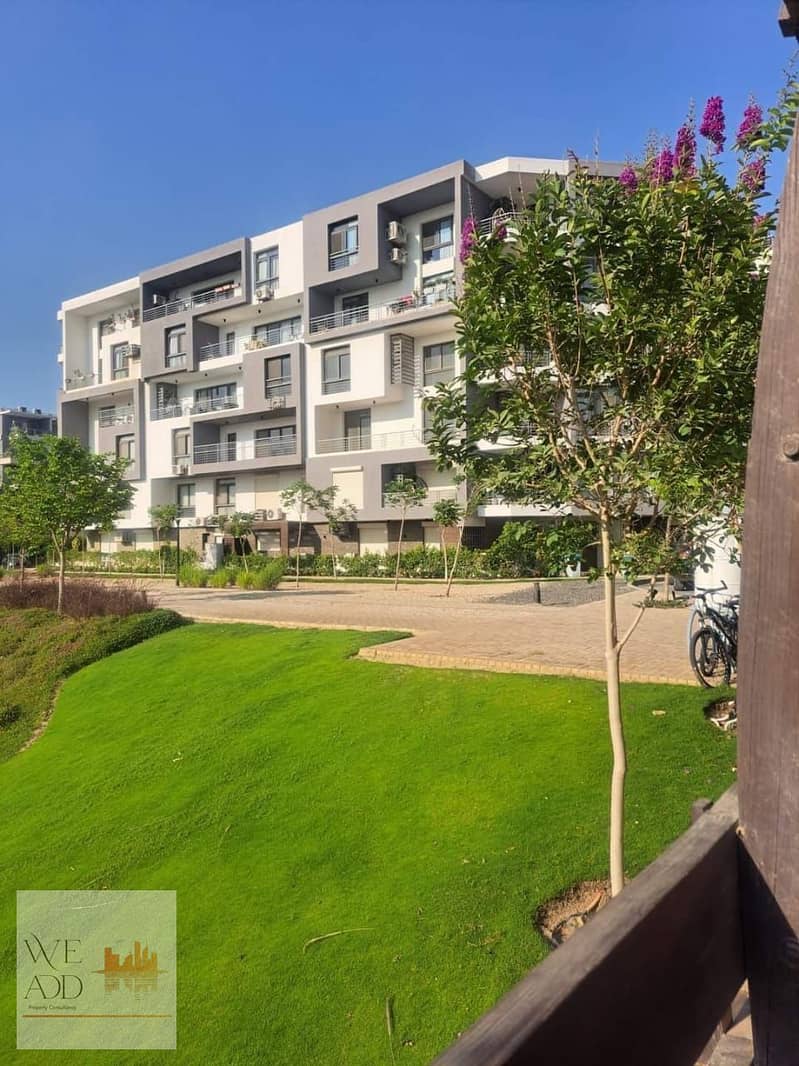 Resale apartment for sale with a down payment of 2.5 million in Taj City compound, with a direct landscape view, Origami phase, in the Fifth 132 23