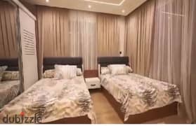 Furnished apartment for rent with hotel furniture in the most prestigious compounds in New Cairo, Azad Compound 0