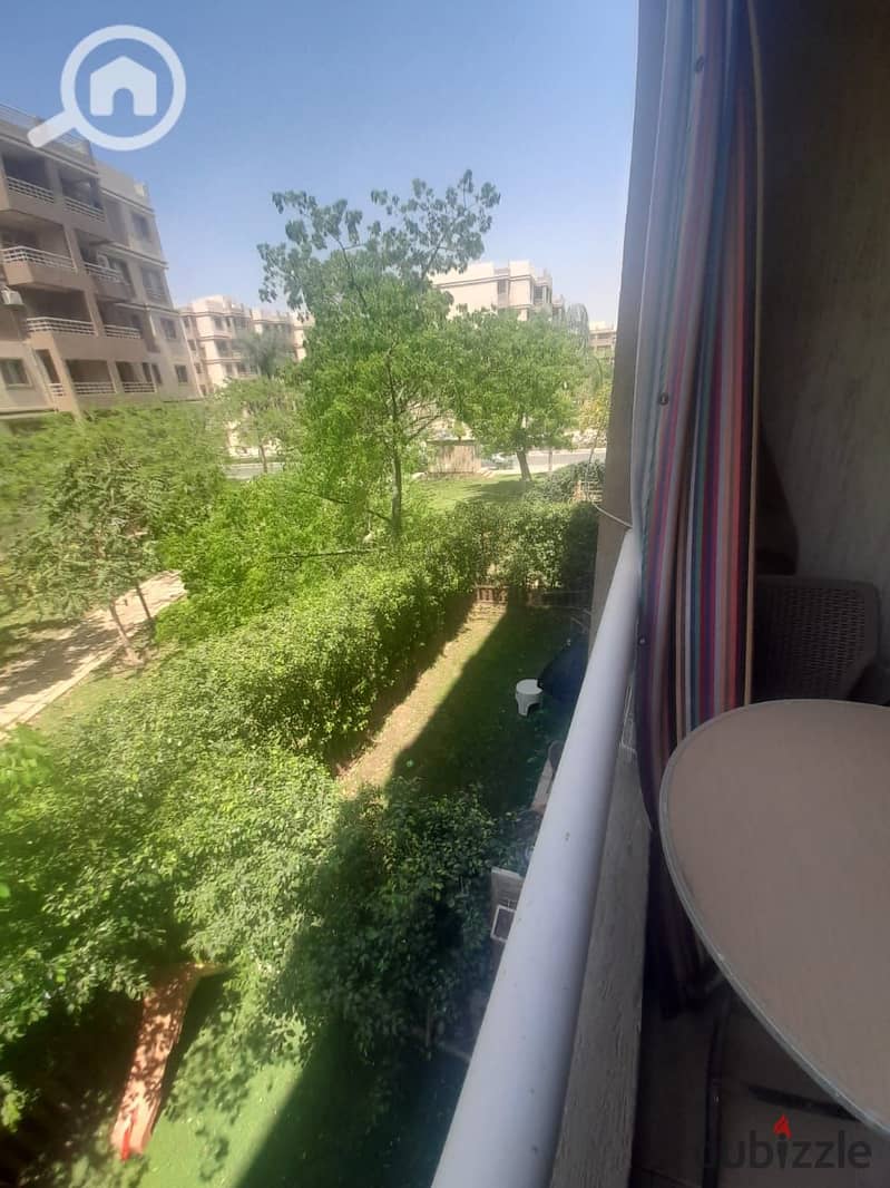 an apartment for sale in b6 of Madinaty city 103m , Open view on Garden with Custom finishes , distinctive location next to all services 18