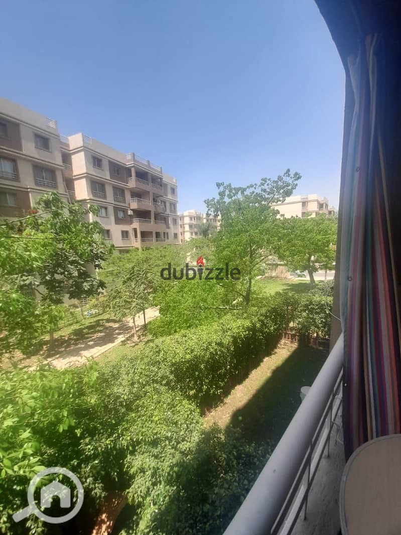 an apartment for sale in b6 of Madinaty city 103m , Open view on Garden with Custom finishes , distinctive location next to all services 19