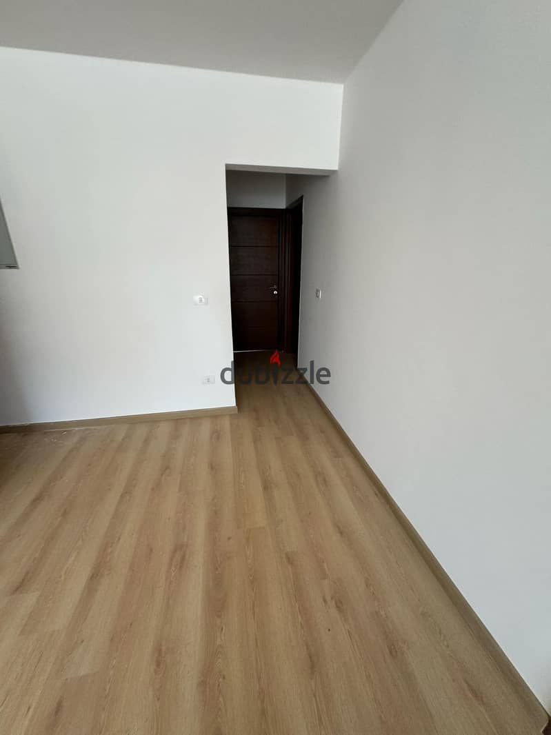 apartment with garden for sale in kayan badreldin compound 7