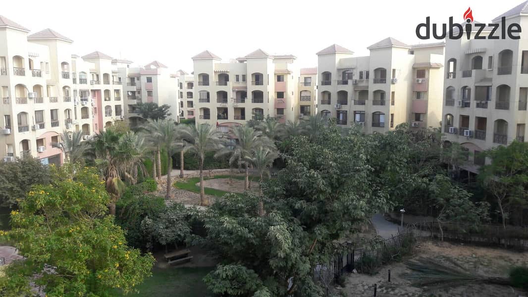 Penthouse for sale in October in Ashgar Compound with a double view of green spaces and water bodies, in installments without interest 11