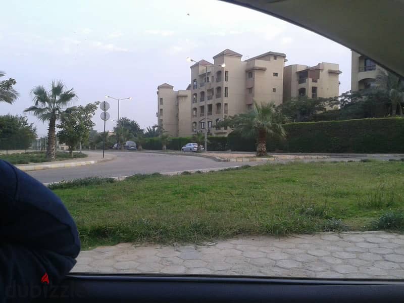 Penthouse for sale in October in Ashgar Compound with a double view of green spaces and water bodies, in installments without interest 12