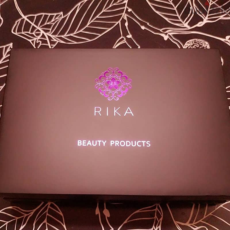 Rika multifunction facial massager with LED light treatments 1