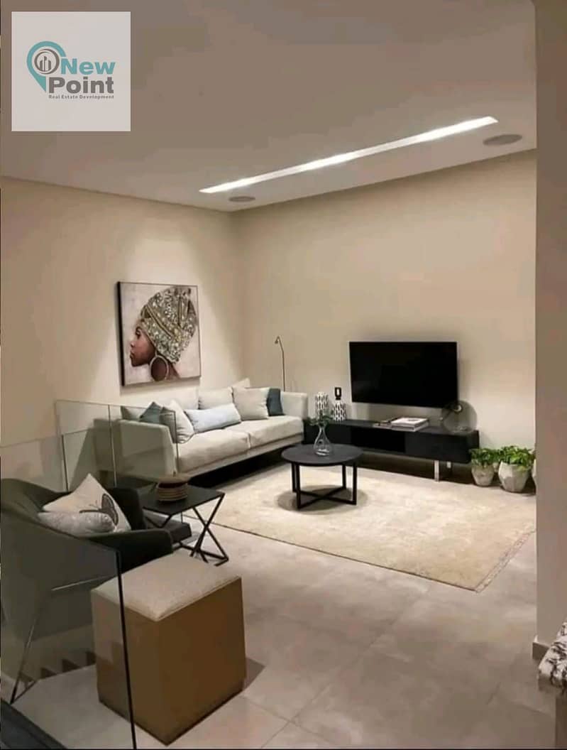 Invest or live in a prime location in the First Settlement, a townhouse villa for sale, prime location, delivery close, directly in front of Al-Rehab 2