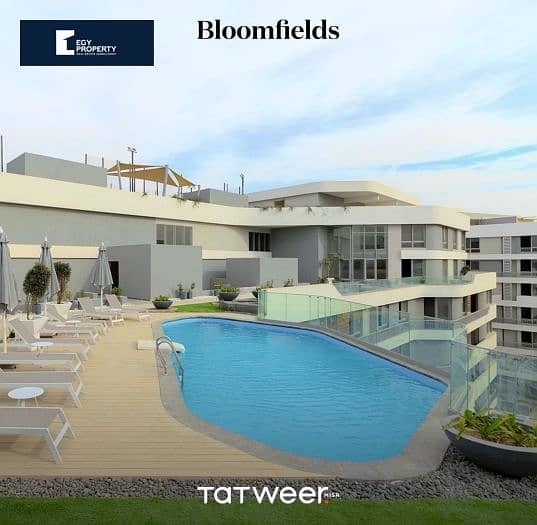 Own a fully finished apartment with near delivery and pay over 10 years inside a compound in Bloomfields 4