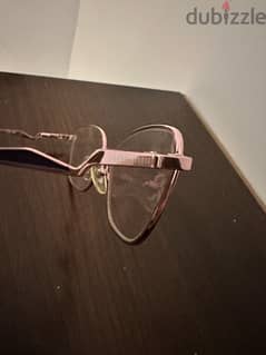 Miu Miu glasses 0