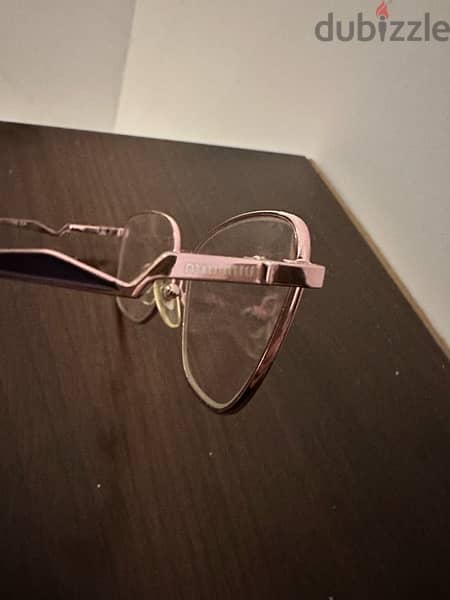 Miu Miu glasses 0