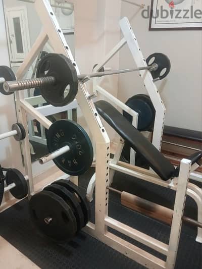 barbell rack, bar, free weights and benches