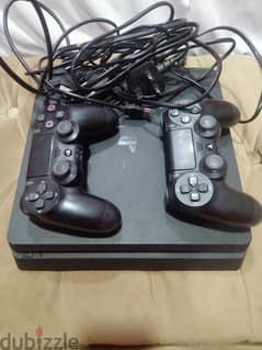 playstation 4 slim with 2 controllers 0