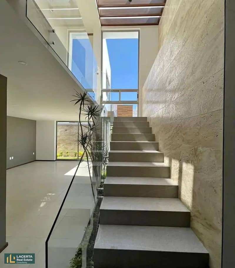 For sale, a 234 sqm villa with a roof, super finished, with the lowest down payment, in the market in the heart of New Heliopolis, in the Sodic East C 6