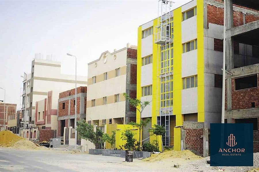 Fully Ready Licensed Factory 6 Floors for sale in industrial zone in Gesr Al Suez 1