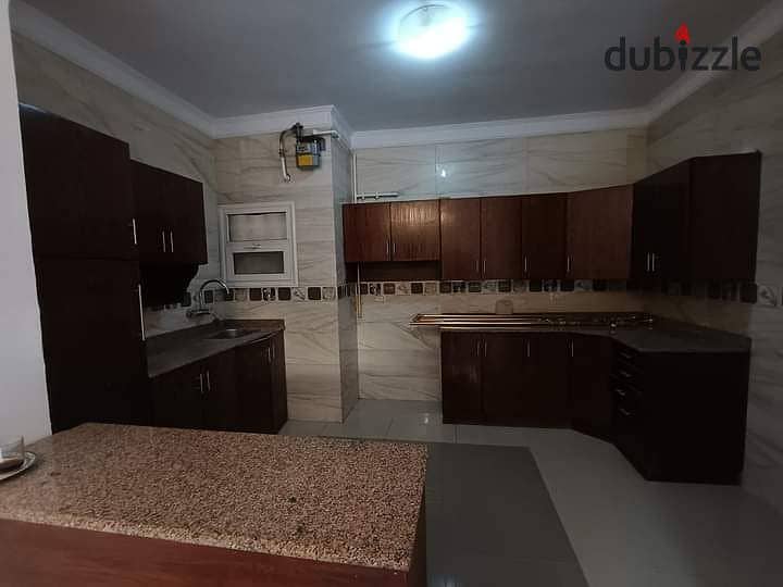 Apartment for rent with kitchen and air conditioners in Banafseg, 9 villas in the First Settlement 4