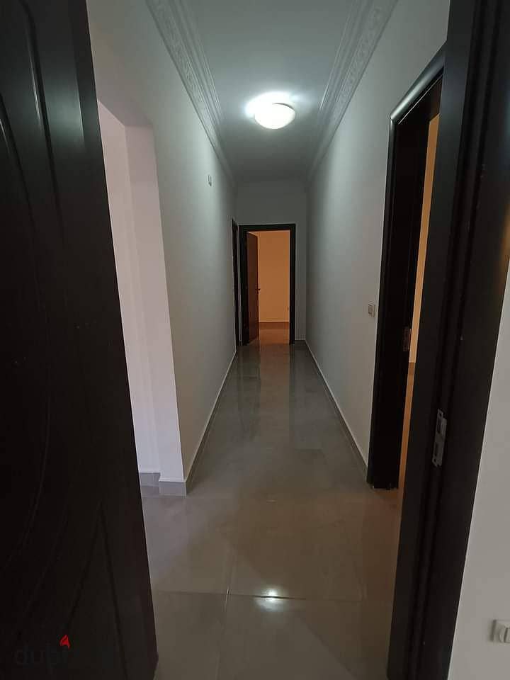 Apartment for rent with kitchen and air conditioners in Banafseg, 9 villas in the First Settlement 6