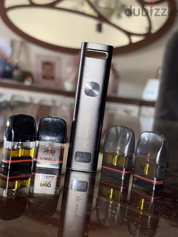 uwell caliburn G3 with 4 cartridges (3 {0.9} 1 {0.6}) pod system 1