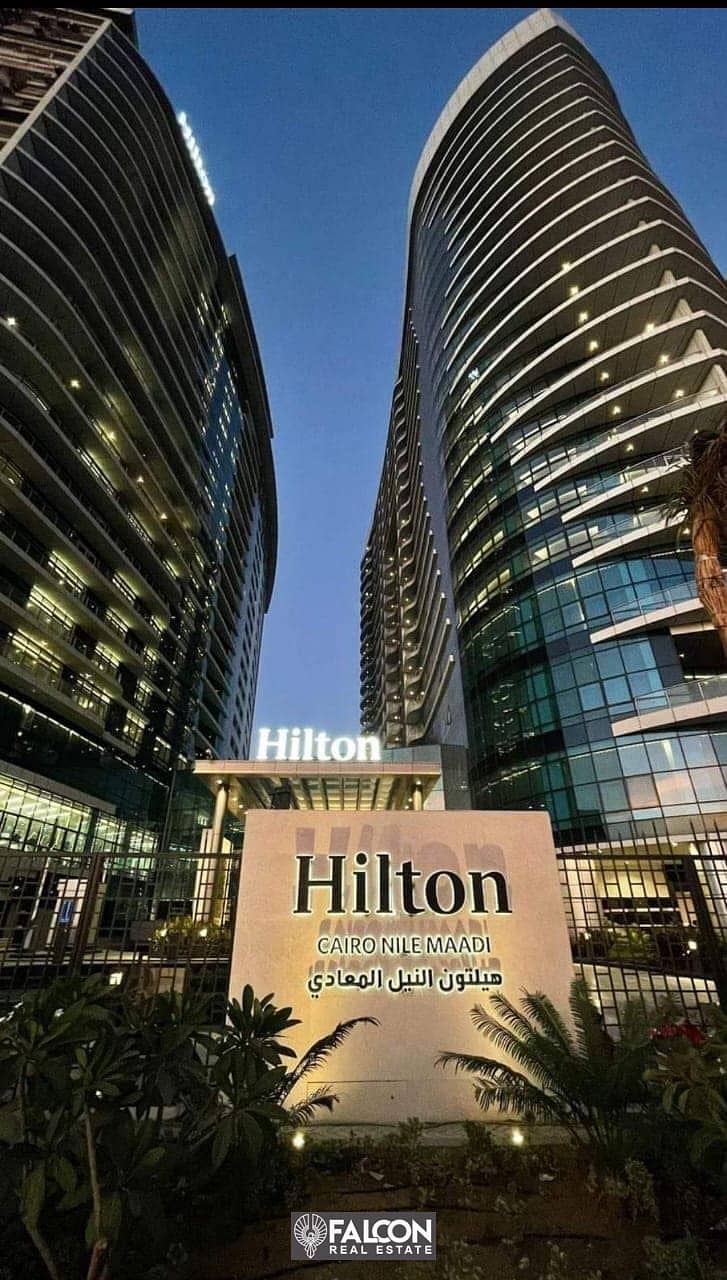 Luxury hotel apartment with a panoramic view on the Nile immediate receipt fully finished and with Hilton Maadi hotel services in the Nile Pearl Tower 3