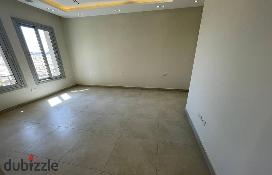 apartment with kitchen , ac`s for rent in village gate new cairo next to auc prime location under market price 3