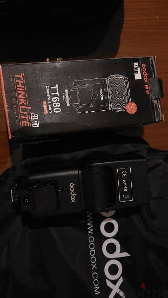 Godox Flash 680 TT for canon + Reflector 5*1 ( 80*120 ) + shoulder bag 7