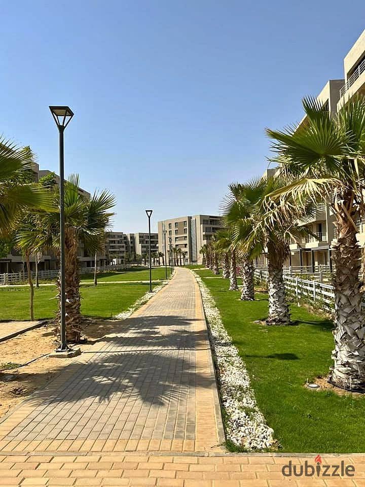 Receive now a fully finished 2-bedroom apartment + garden, 60 m, in Badya Palm Hills, in front of Sheikh Zayed, in installments 3