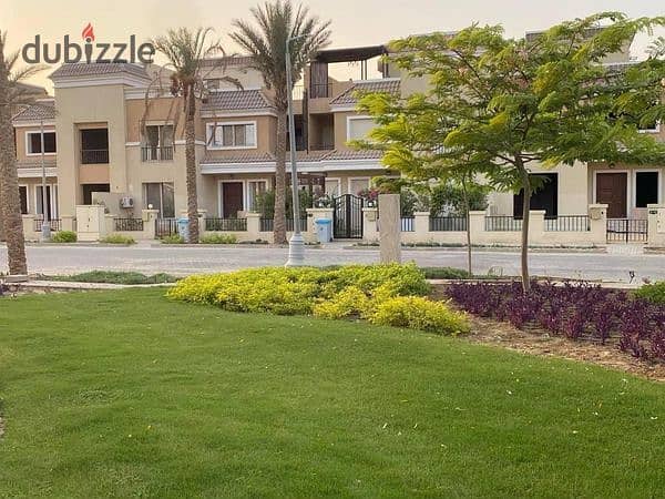 For sale, S Villa  212 m  + garden 106 m , in a villas only compound directly on the Suez Road, with installments over 8 years 4