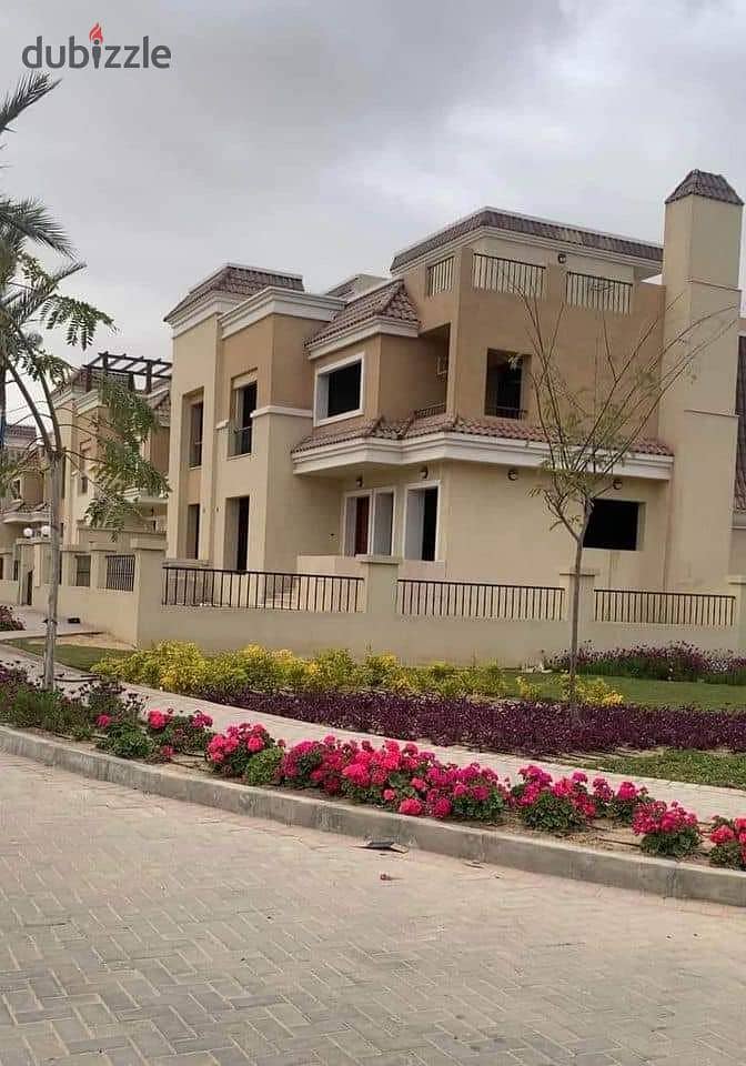 For sale, S Villa  212 m  + garden 106 m , in a villas only compound directly on the Suez Road, with installments over 8 years 9