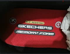 skechers work . 0