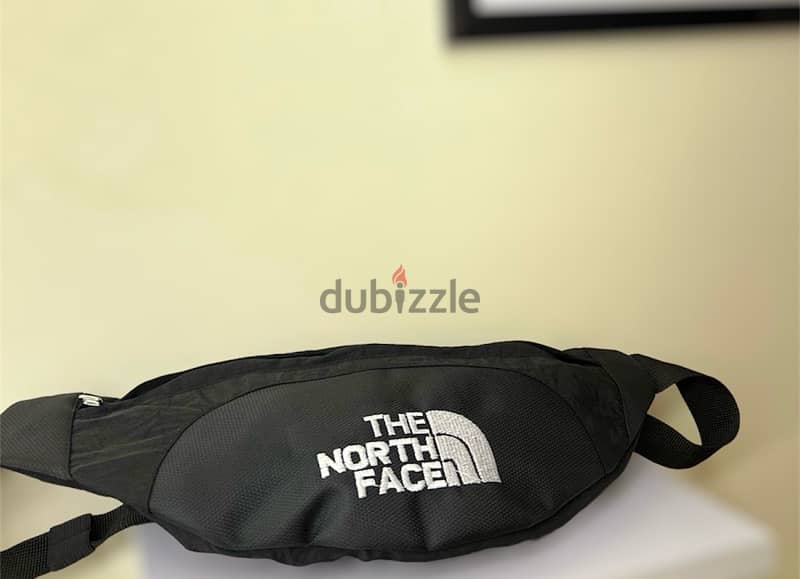 The NorthFace Cross and waist bag 1