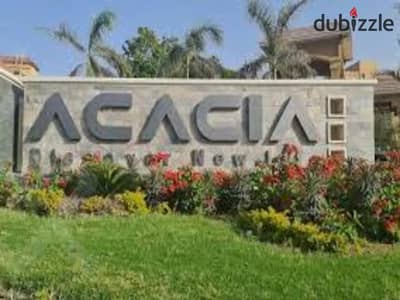 apartment for sale at acacia infront of al rehab new cairo | fully finished | Ready to move | ground with garden | prime location